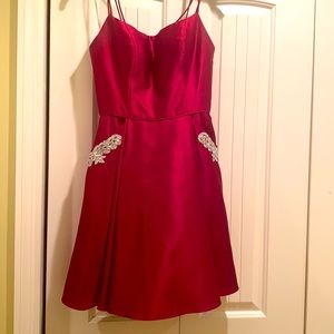 Formal homecoming dress. Burgundy. Silver pocket details. Size 5. Stacy Sklar.